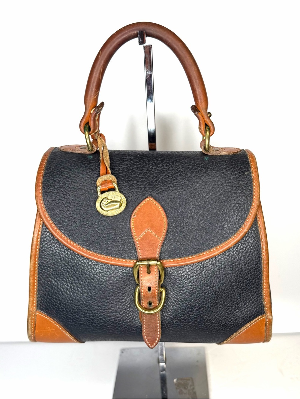Dooney & Bourke Black Pebbled Leather Satchel with Brown Trim and Gold Hardware